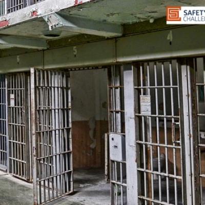 Prison cell blocks with open door