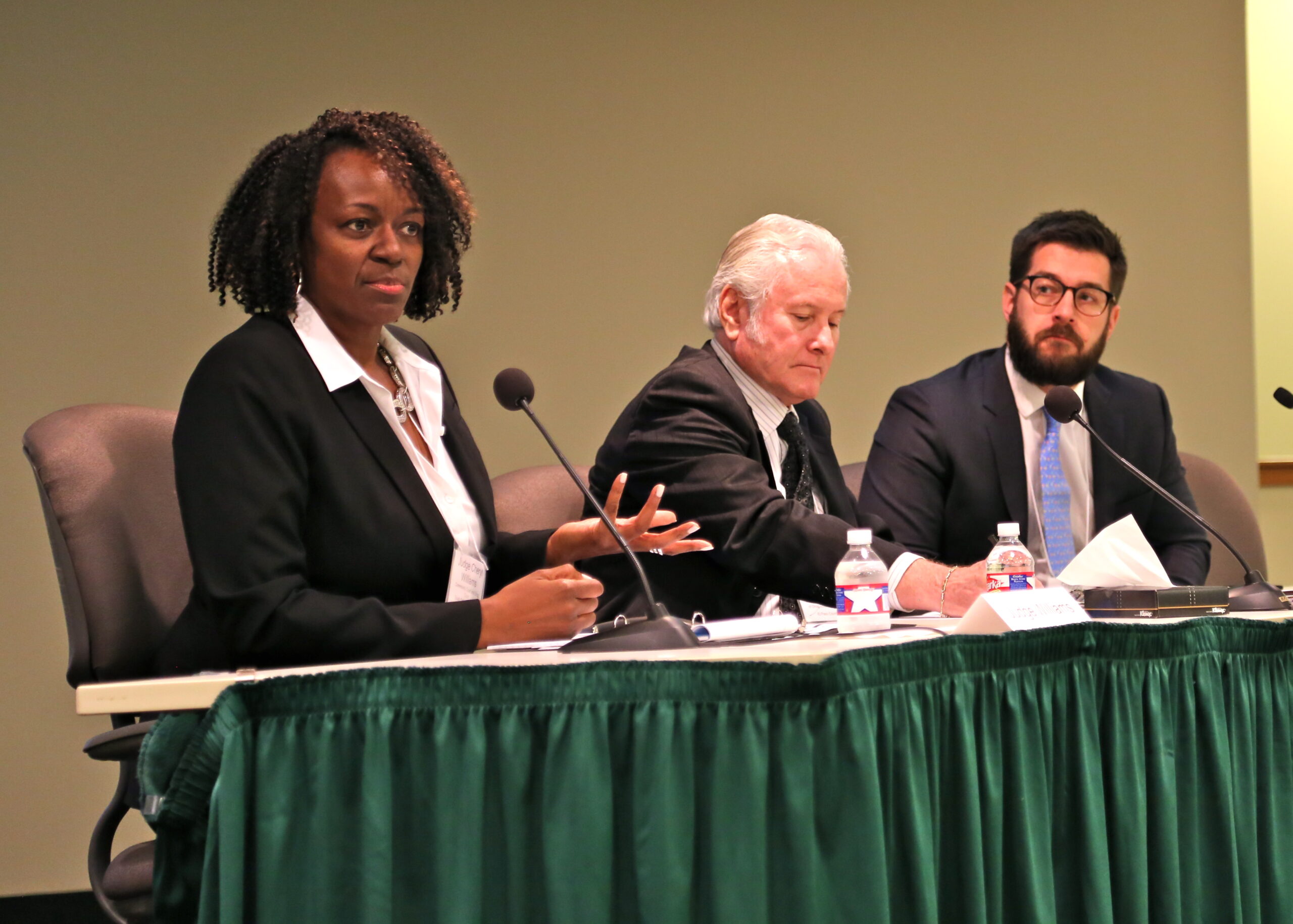 Judge Cheryl Williams of the South Dallas Community Court speaks on a panel about changing offender behavior with Jay Nye (center) of the El Paso County Public Defender’s Office and Gregory Midgette of the RAND Corporation.