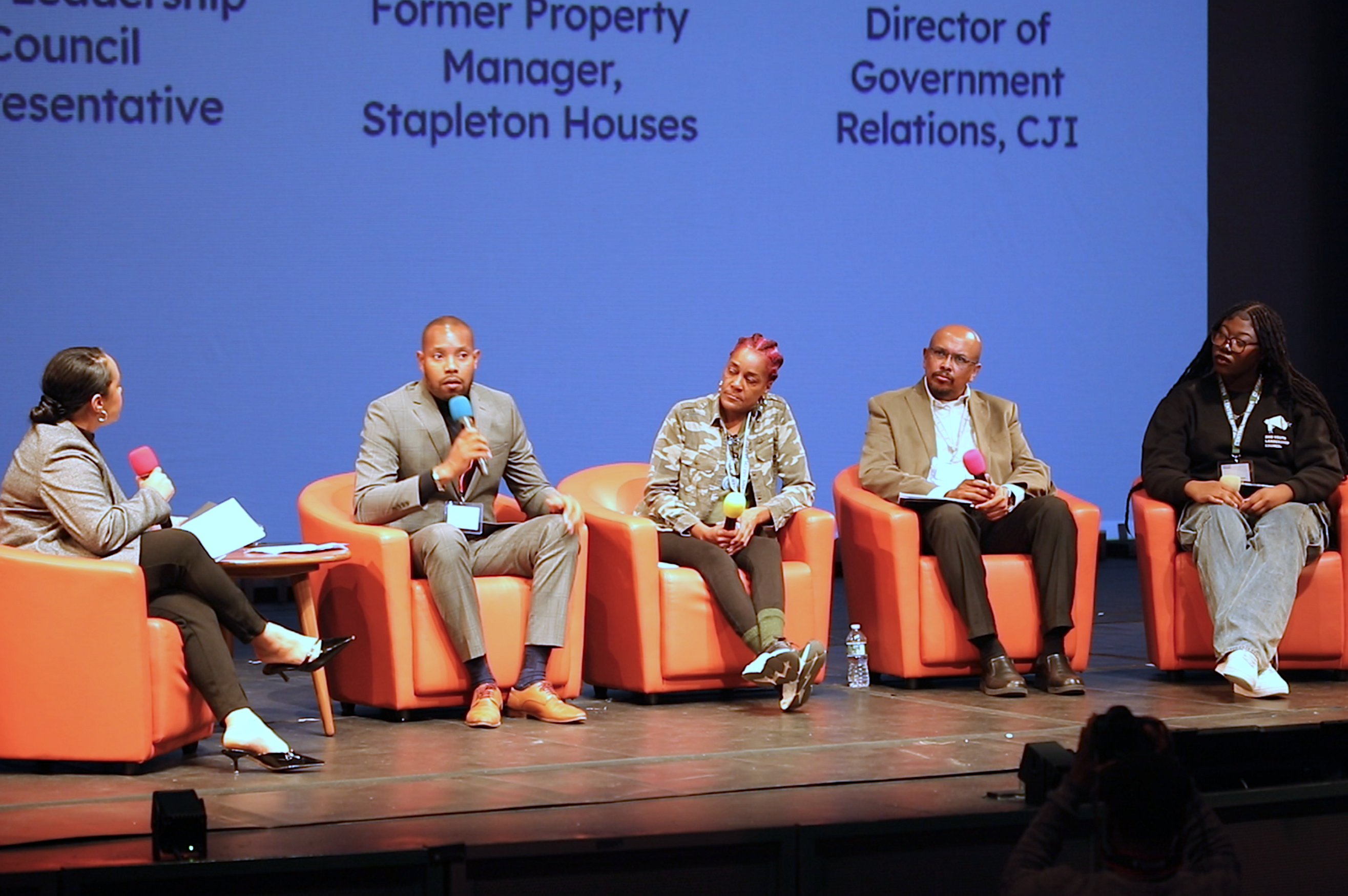 On-stage panel discussion at Community Policy Breakfast.