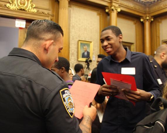 Neighborhood Coordination Officer Ingoglia and Red Hook Youth Court member Mehki