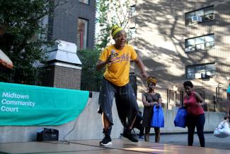 Ethel of Alvin Ailey leads an Arts in Education Workshop at a Midtown Community Court event.