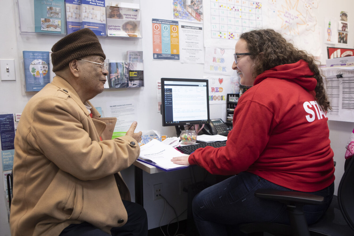 Redhook Community Justice Center staff member having a one on one with a client.