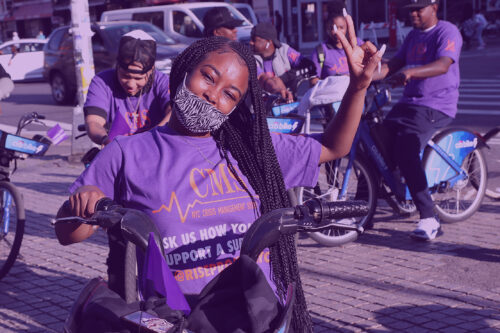 A woman in a purple 