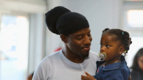 East New York father spends quality time with his daughter in BJI office