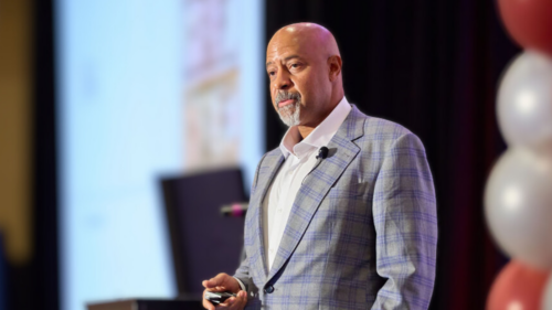 Roy Austin, Jr. speaks on stage