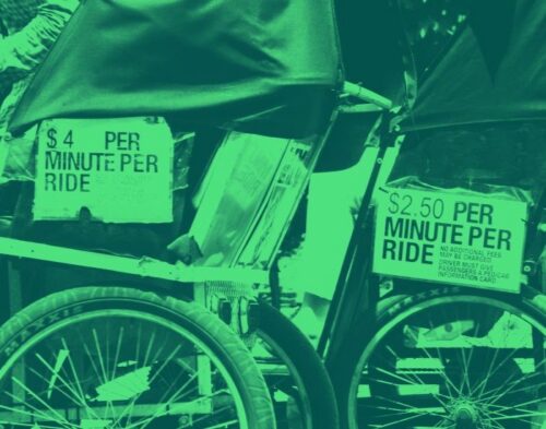 Green overlay on an image of pedicab wheels with signs that read 